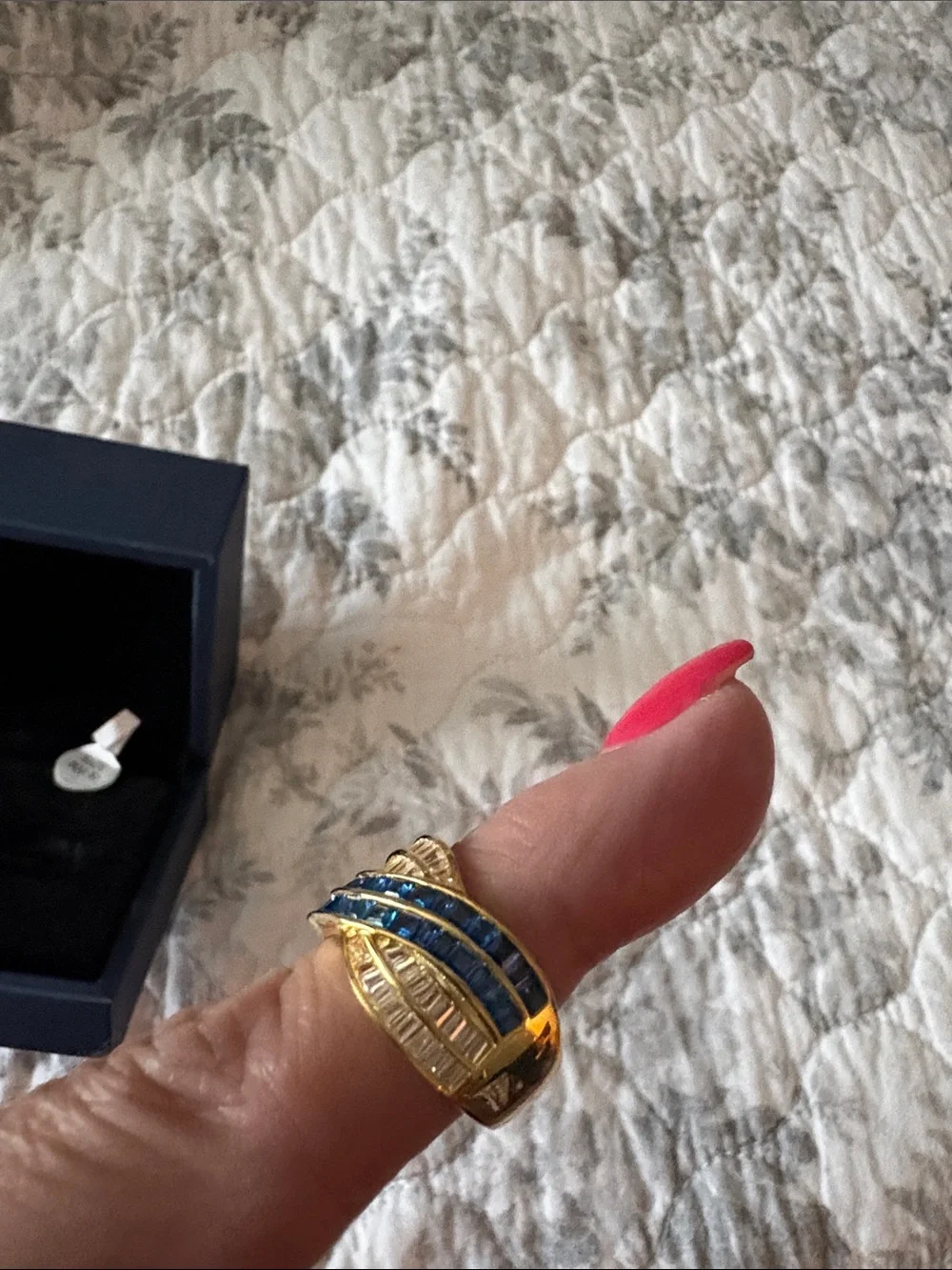 Gold-tone Wave Ring with Blue and Clear Stones